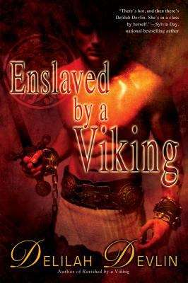 Book cover of Enslaved by a Viking