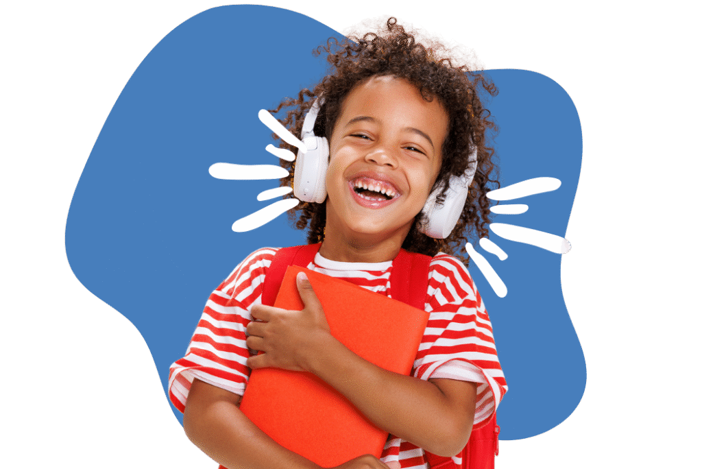 Middle grade student smiling with headphones and holding binder.